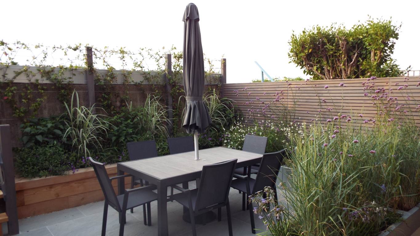 FuchsiaGreenltd_Garden_Design_Coastal_Garden_porcelainpaving_Planting_outdoor_seating